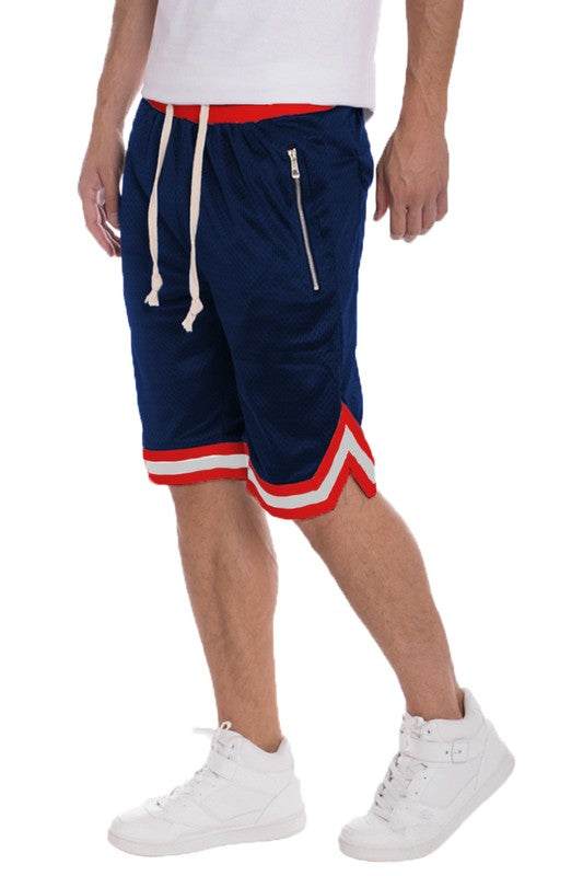 Striped band basketball shorts with contrast waistband and hem, featuring zipper pockets.